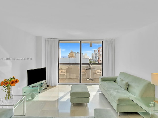 living room with floor to ceiling windows