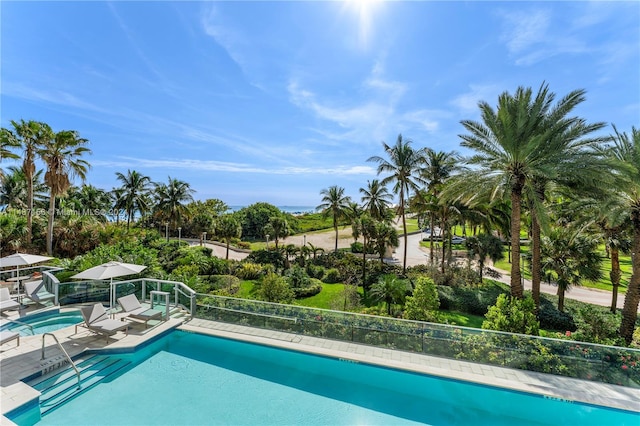 view of swimming pool with a patio