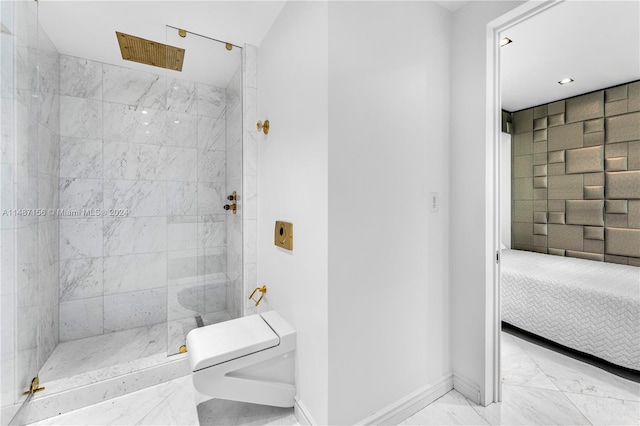 bathroom with toilet, a tile shower, and tile floors