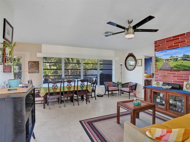 living room featuring ceiling fan