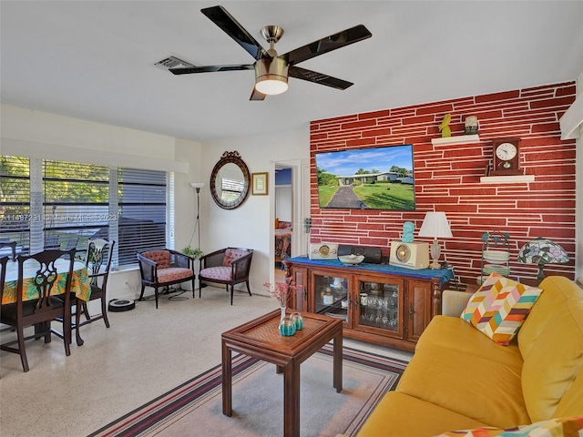 living room featuring ceiling fan