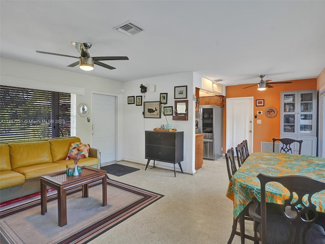 living room with ceiling fan