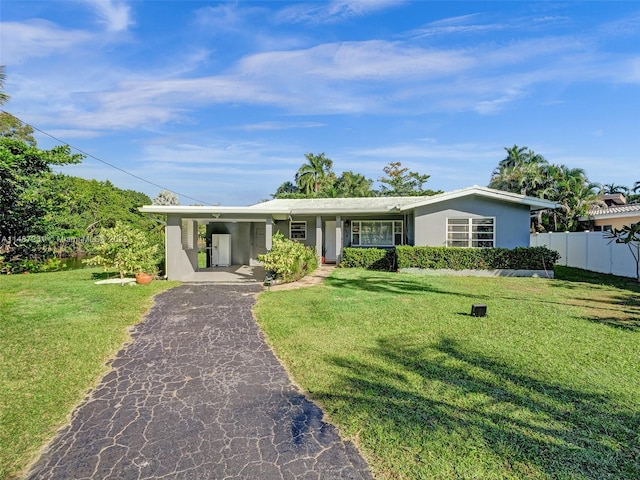 ranch-style home with a front lawn