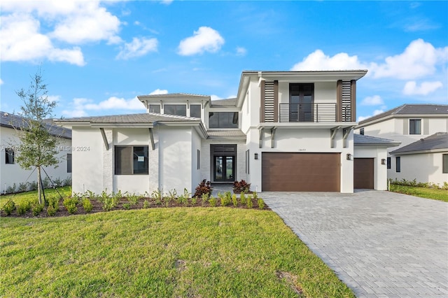 10455 SW 57th Ct, Cooper City, FL 33328 - view of front facade with a front lawn and a garage
