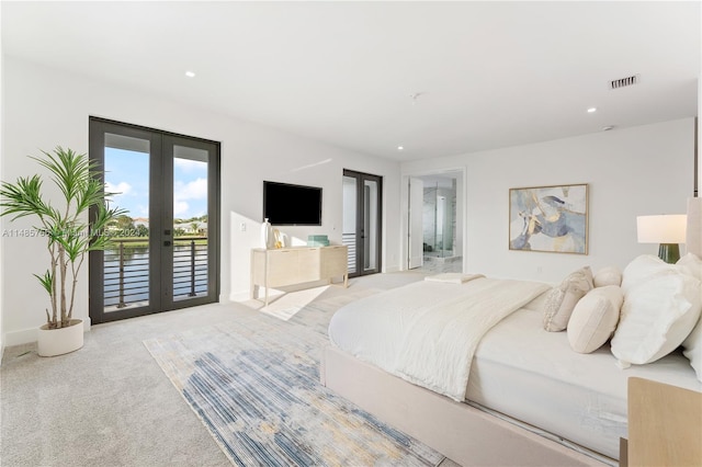 10455 SW 57th Ct, Cooper City, FL 33328 - bedroom with light carpet, access to exterior, connected bathroom, and french doors