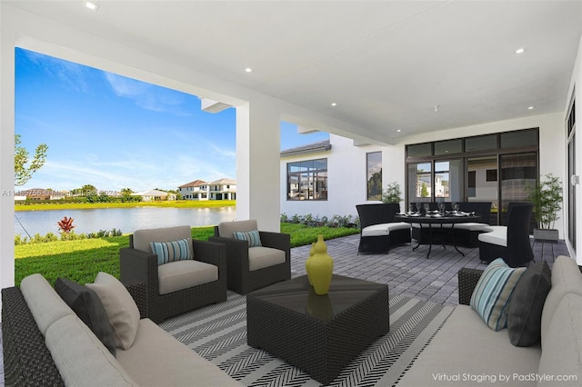 10455 SW 57th Ct, Cooper City, FL 33328 - view of patio / terrace with outdoor lounge area and a water view