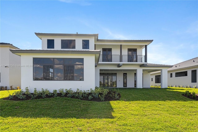 10455 SW 57th Ct, Cooper City, FL 33328 - view of front of property with a balcony and a front yard