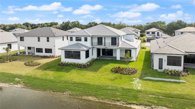 10455 SW 57th Ct, Cooper City, FL 33328 - view of front of property featuring a balcony and a front yard