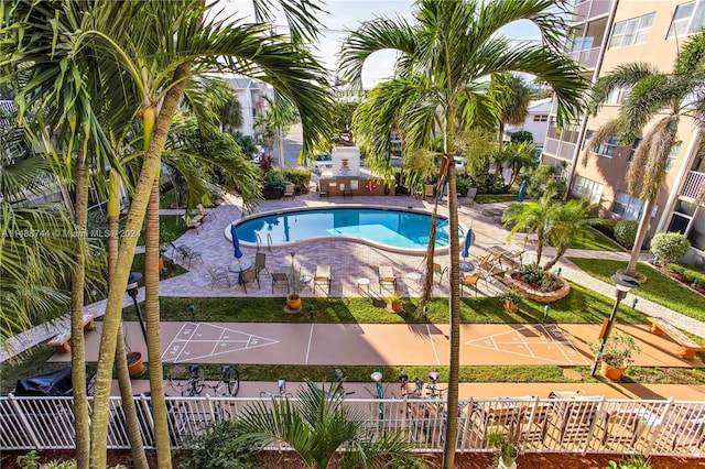 view of swimming pool featuring a patio area