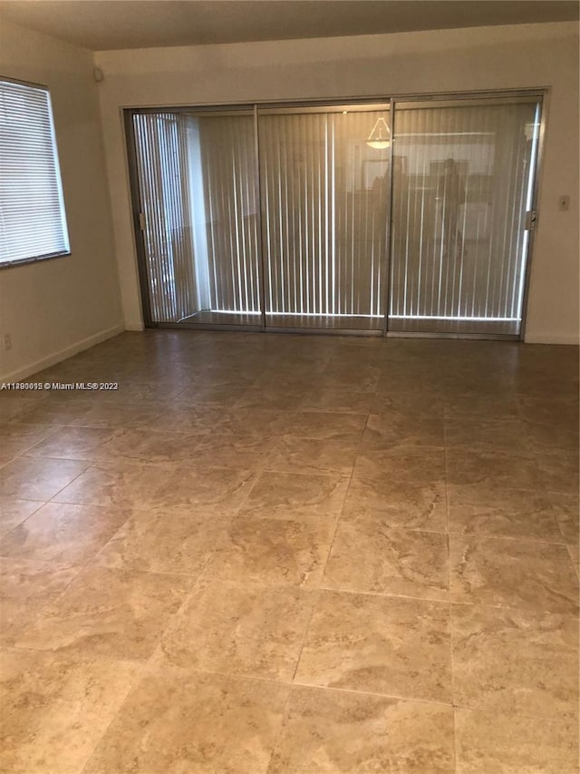 view of tiled empty room