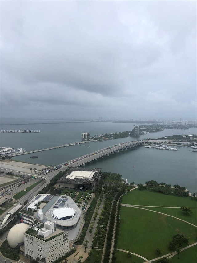 birds eye view of property featuring a water view