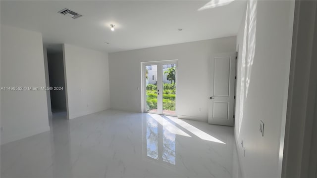 empty room with light tile flooring