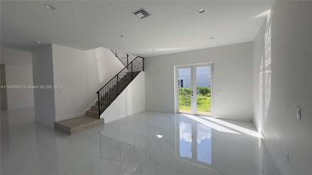 interior space featuring light tile floors