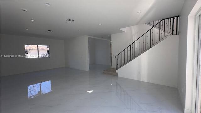 empty room featuring light tile floors