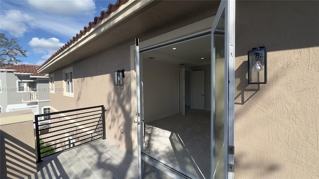 view of property exterior with a balcony