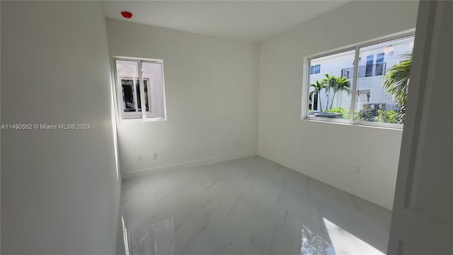 view of tiled spare room