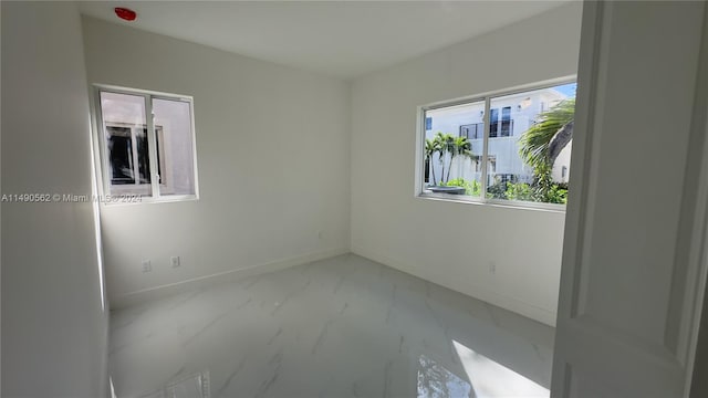 view of tiled empty room