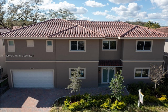 view of front of house with a garage