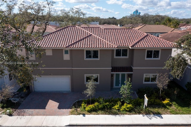 view of front of home with a garage