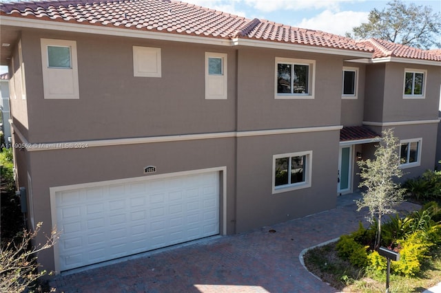 exterior space with a garage