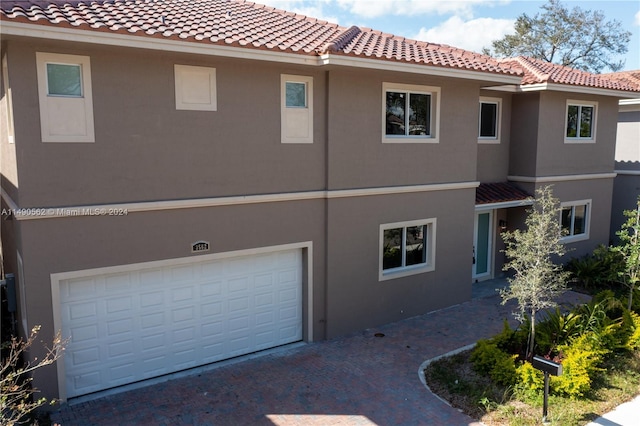 exterior space with a garage