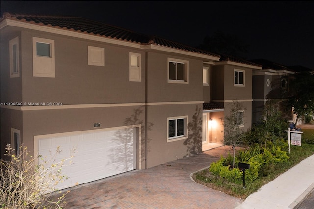 view of property with a garage