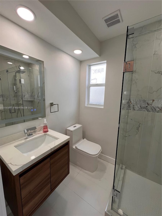 full bathroom featuring a marble finish shower, visible vents, toilet, vanity, and recessed lighting