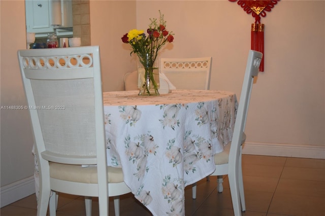 view of tiled dining space