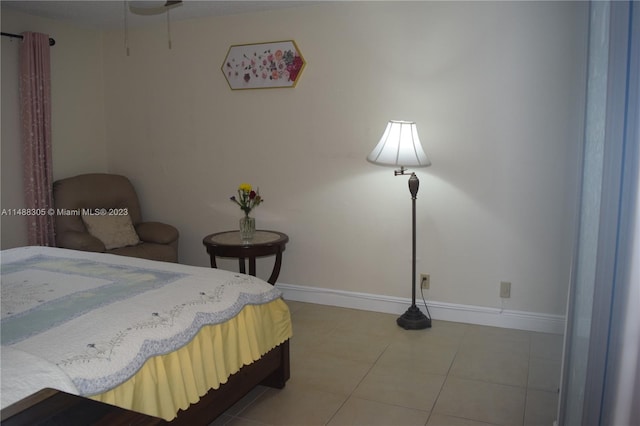 bedroom with light tile floors