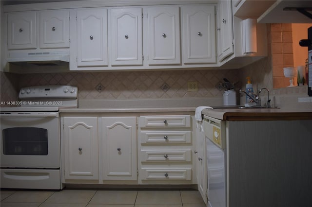 kitchen with backsplash, white range oven, white cabinetry, and wall chimney range hood