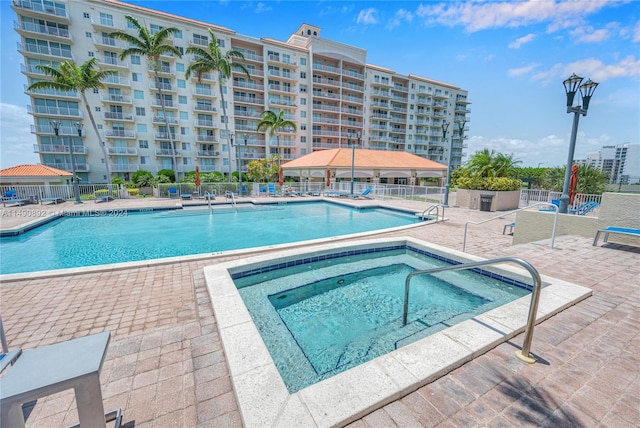 view of pool with a patio and a gazebo