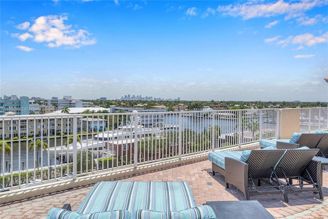 view of patio / terrace featuring an outdoor living space and a water view