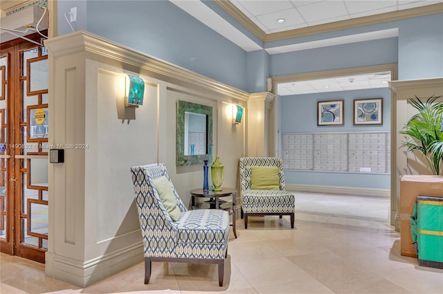 sitting room featuring tile patterned flooring