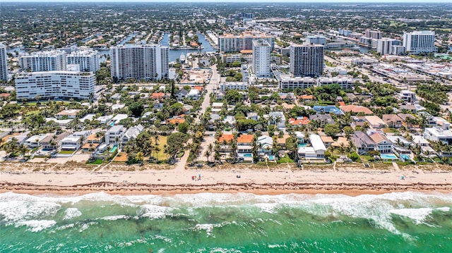 aerial view featuring a water view and a beach view