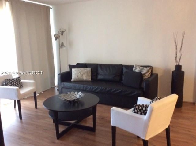 living room featuring hardwood / wood-style floors