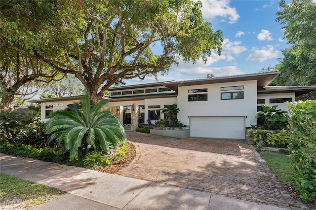 view of front of property featuring a garage