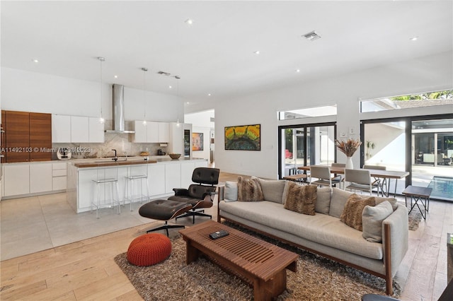 living room with light hardwood / wood-style flooring