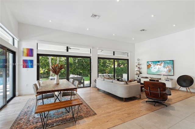 living room featuring plenty of natural light and light wood-type flooring