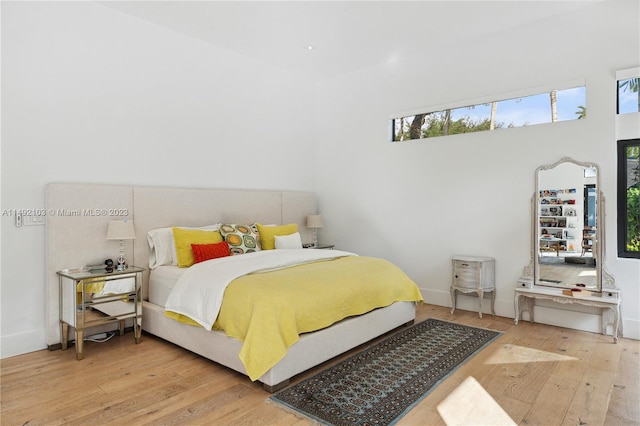 bedroom featuring light wood-type flooring