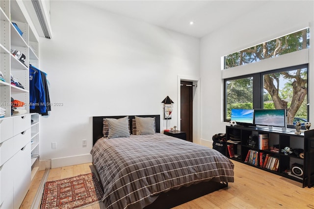 bedroom featuring light hardwood / wood-style floors