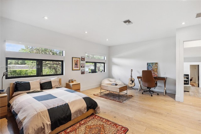 bedroom featuring light wood-type flooring