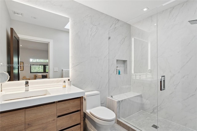 bathroom featuring an enclosed shower, vanity, toilet, and tile walls