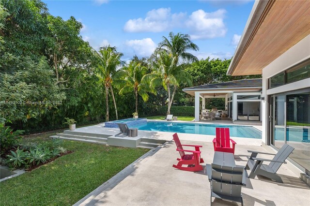 view of pool with a patio area