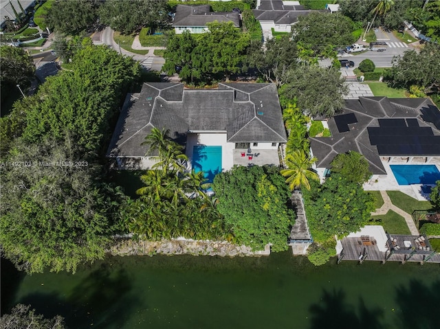 birds eye view of property featuring a water view