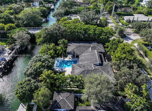 bird's eye view with a water view