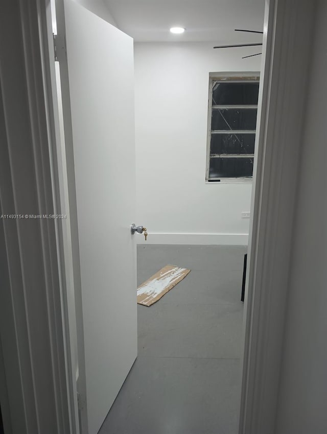 bathroom featuring concrete floors