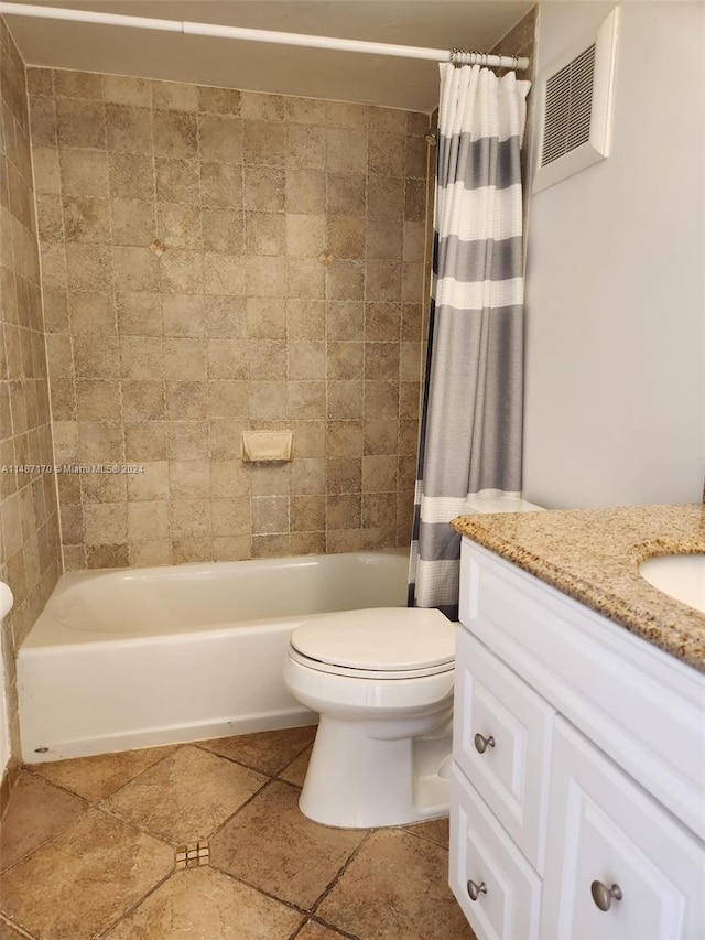 full bathroom with vanity, shower / bath combination with curtain, tile floors, and toilet