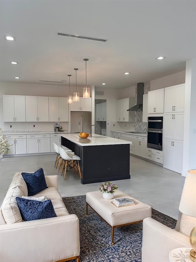 living room with recessed lighting