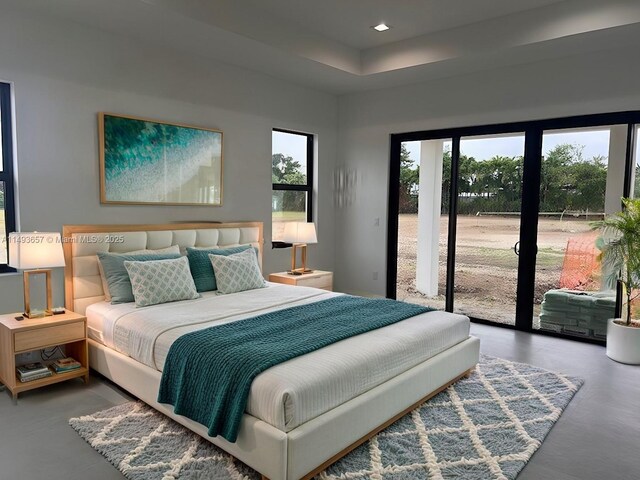 bedroom featuring access to outside and recessed lighting