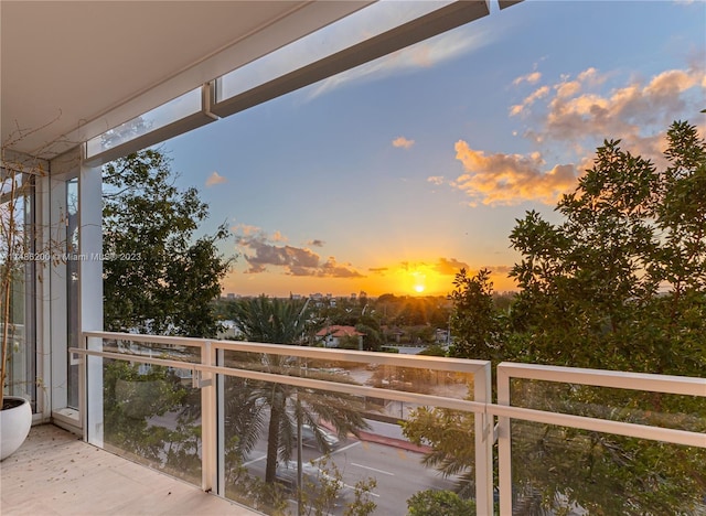 view of balcony at dusk